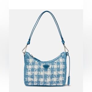 PRADA
Re-edition Mini crochet bag

NWT!! - pristine condition with dust bag